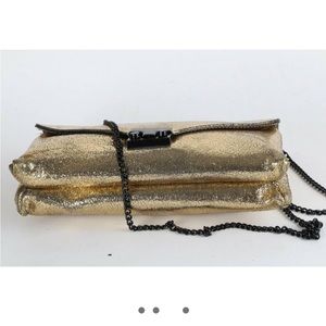 Beautiful gold envelope Loeffler Randal purse.